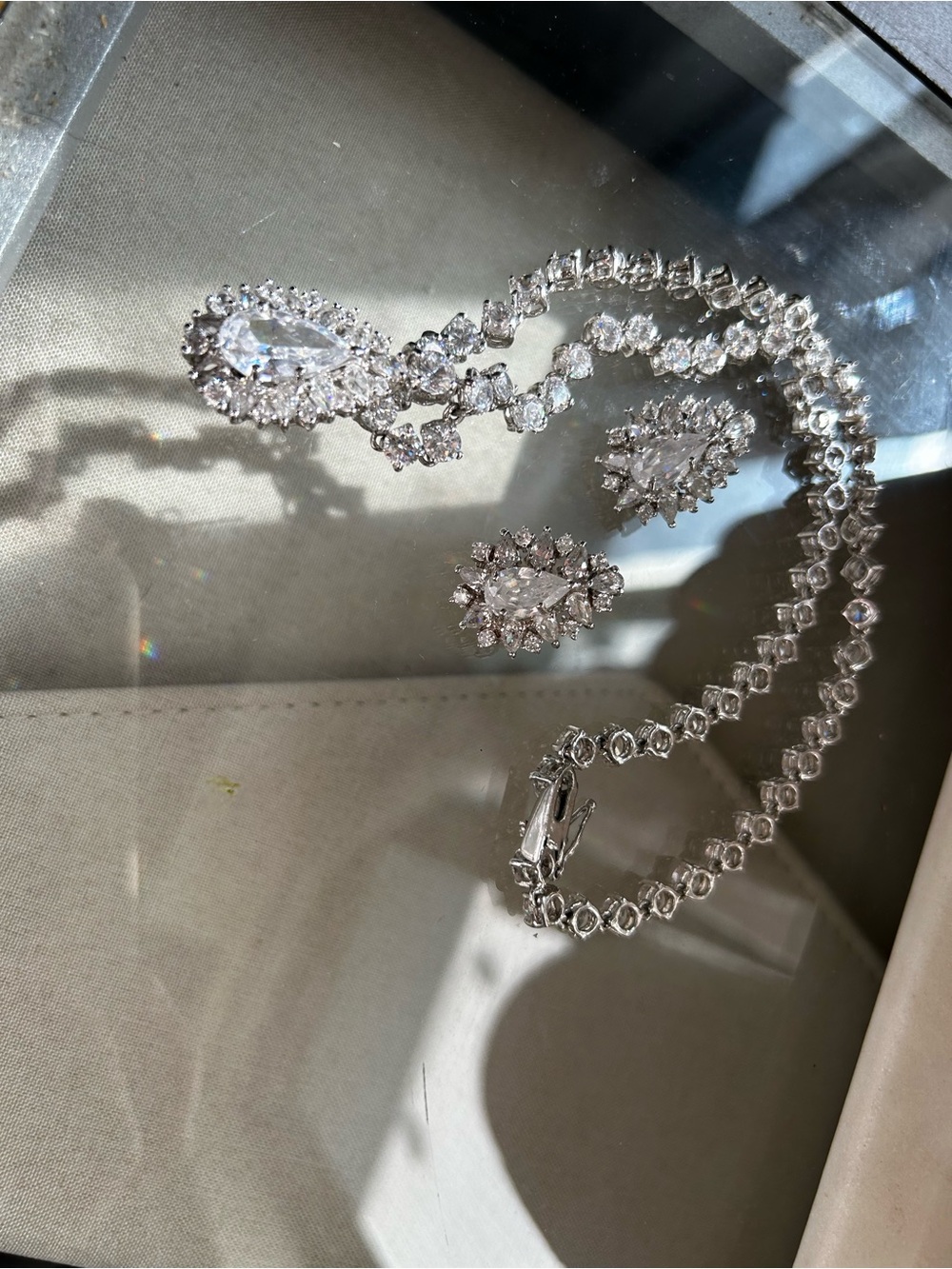 Silver Crystal Teardrop Necklace and Earrings Set and two rings